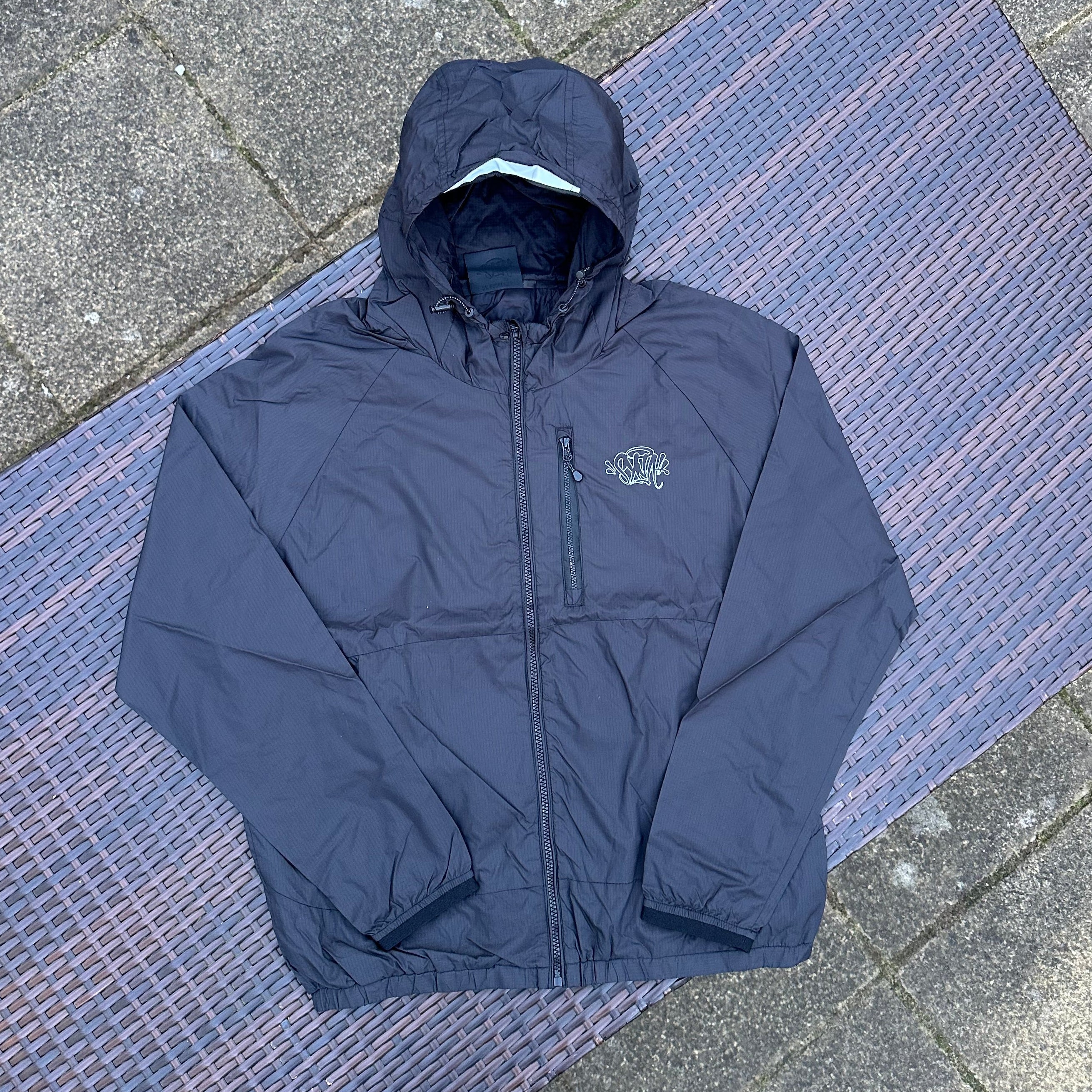 Syna World OG Logo Storm Jacket/Bag