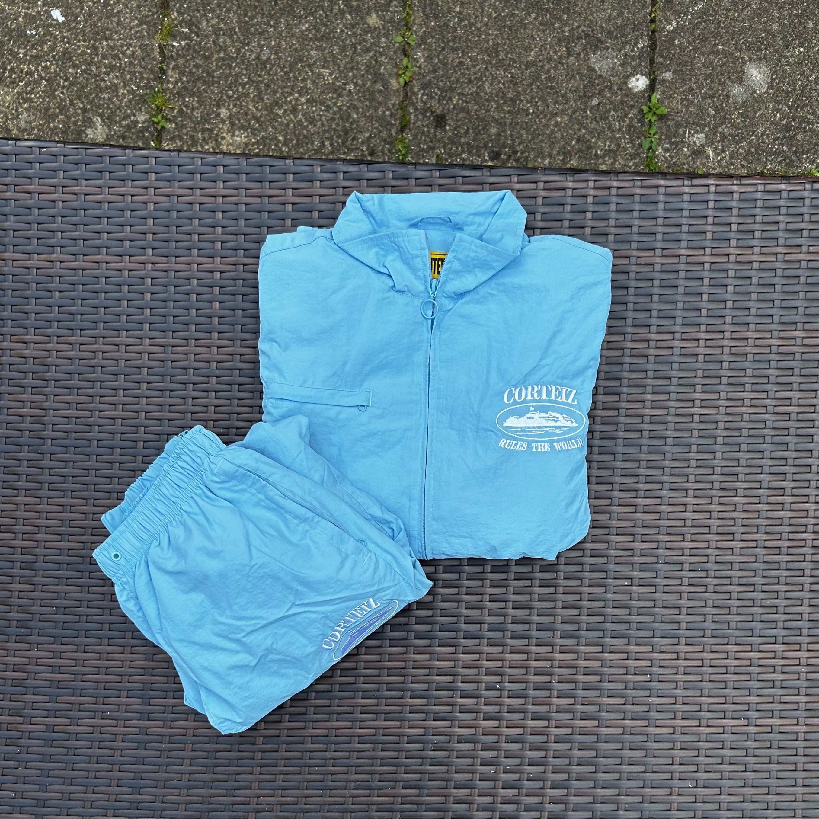 Corteiz Baby Blue/White "Shukushuku" Tracksuit