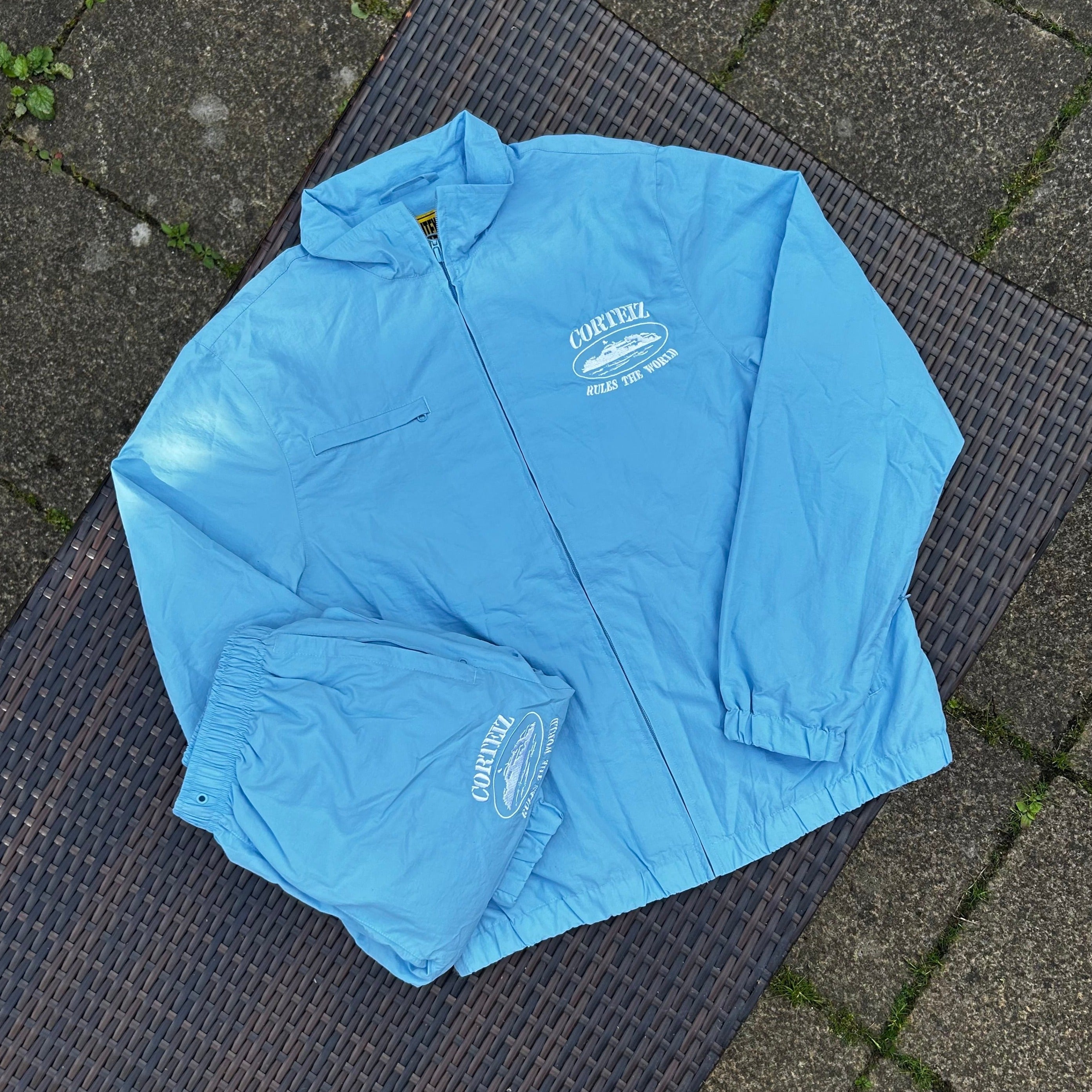 Corteiz Baby Blue/White "Shukushuku" Tracksuit